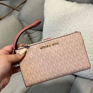 Pink/dusty rose Michael kors wristlet/wallet
